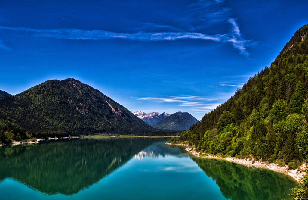 a large river amongst hills